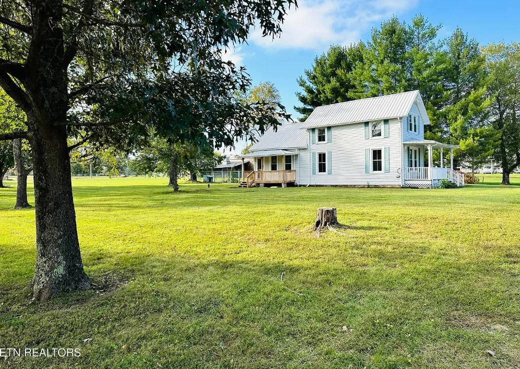 Pretty fretwork inside! Circa 1935. One acre in Tennessee. $268,900