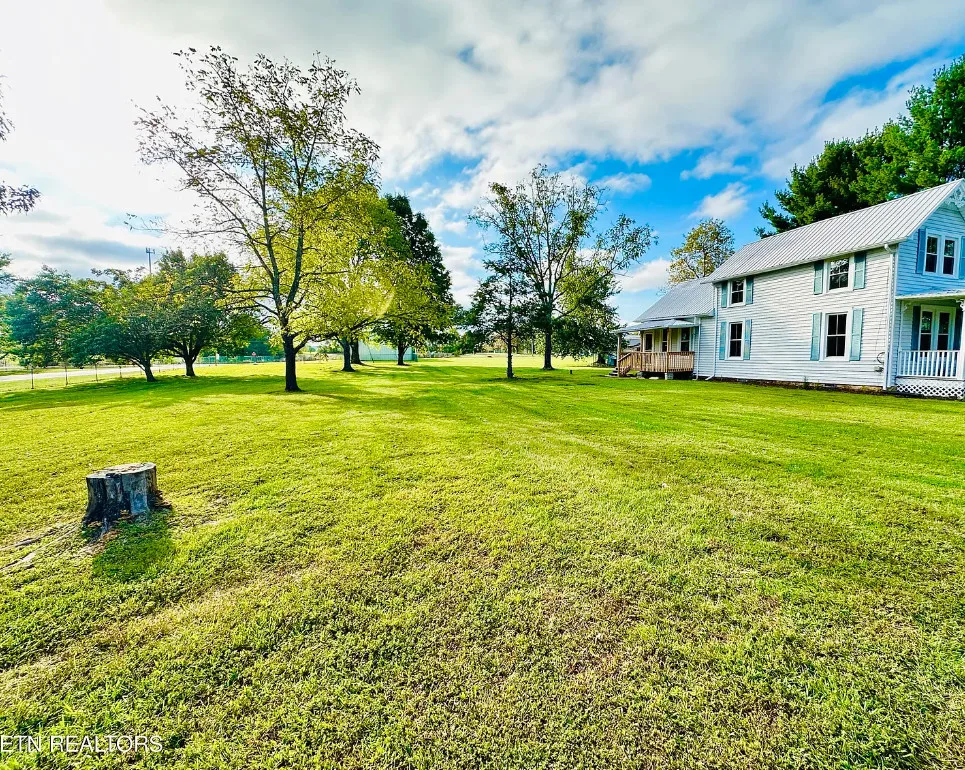 Pretty fretwork inside! Circa 1935. One acre in Tennessee. $268,900
