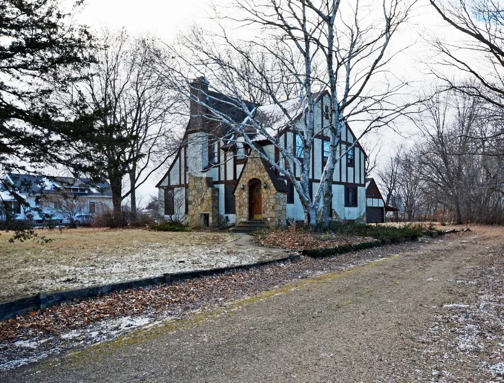 Tudor style home on one acre in Minnesota. C. 1936. $199,900