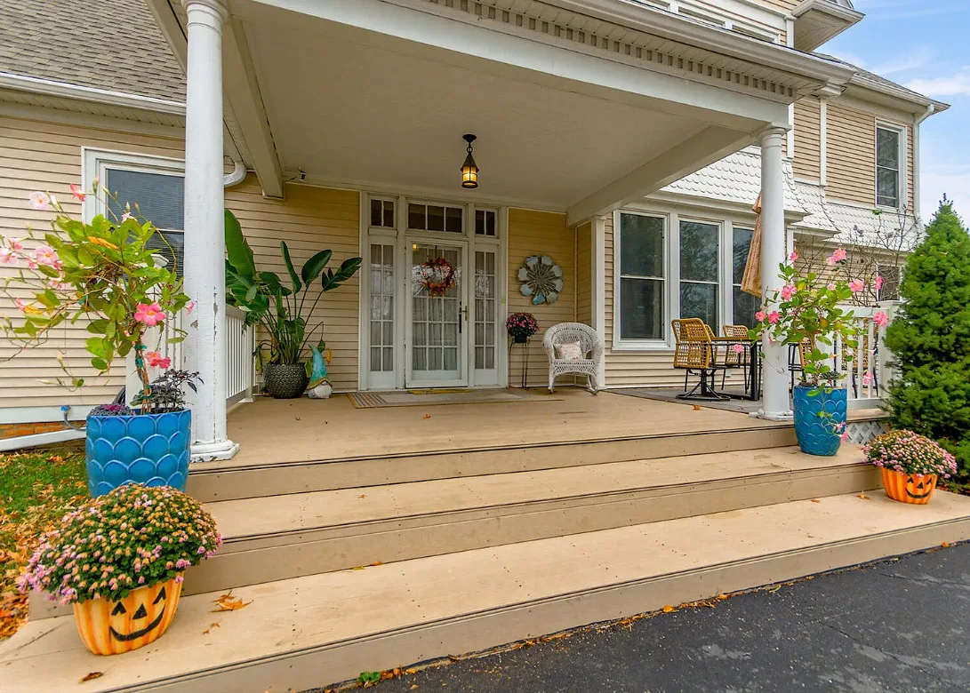 Pretty interior! Two staircases! Circa 1905 in Missouri. $287,000