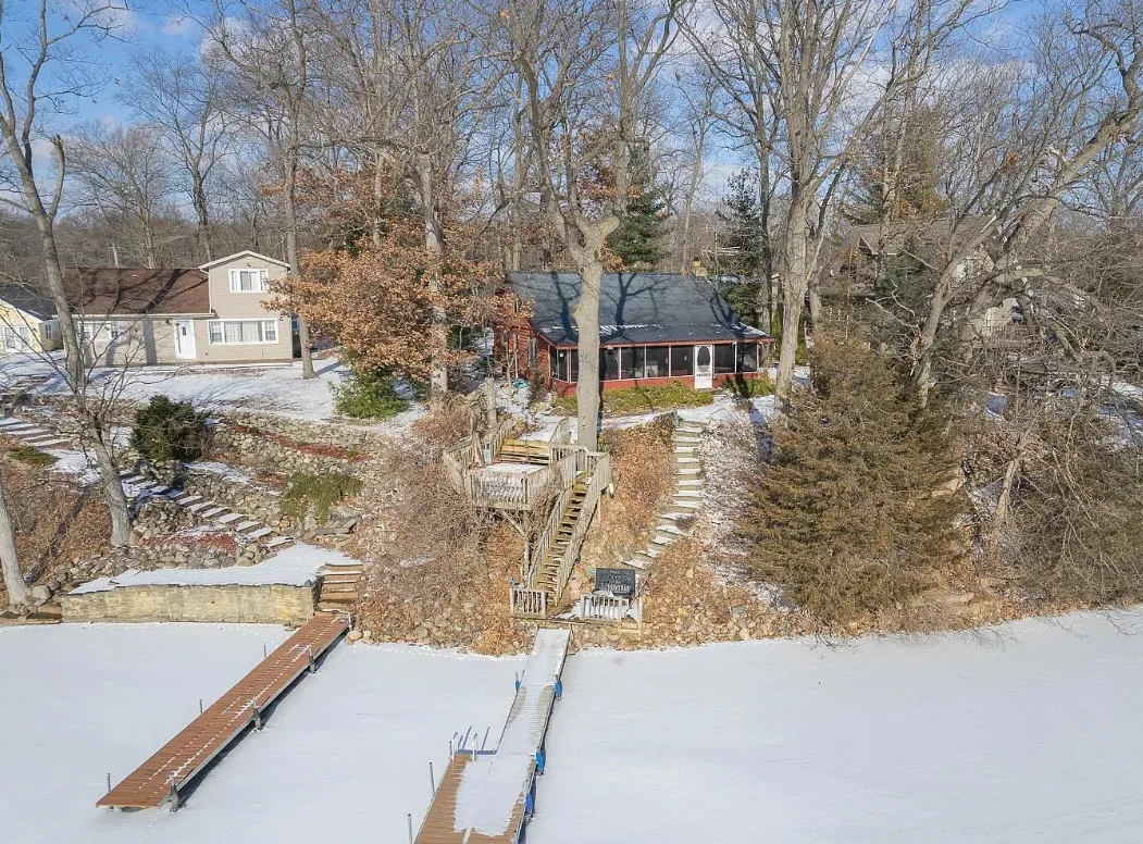 Lakefront cabin in Michigan! That lake looks mighty chilly! $275,000