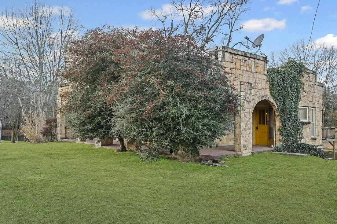 Like a little castle! Almost four acres in Alabama with a pond. $265,000